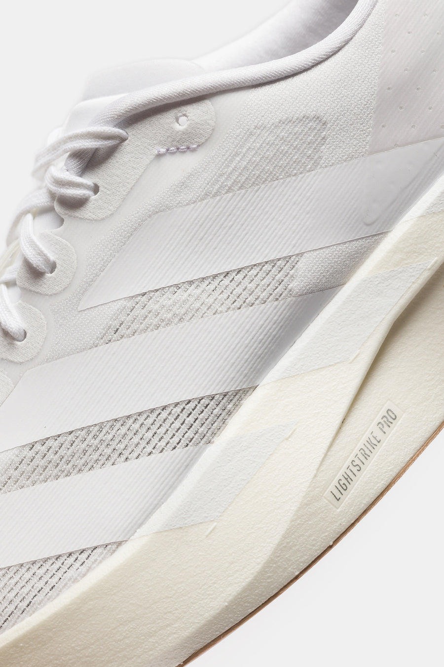 adidas Adizero Evo SL Sneaker in White/White/Sandstone - Notre