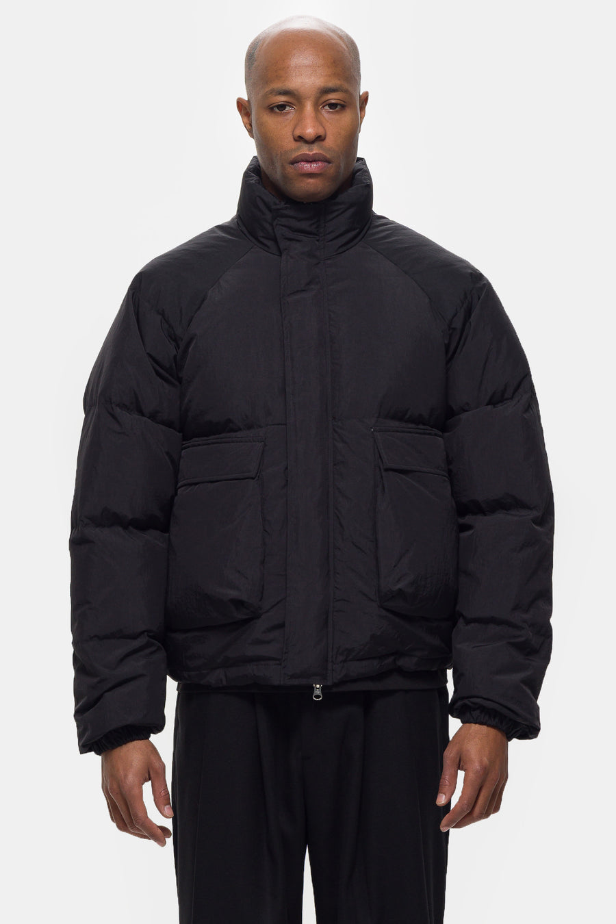 Estudio Niksen Raglan Puffer Jacket in Black - Notre