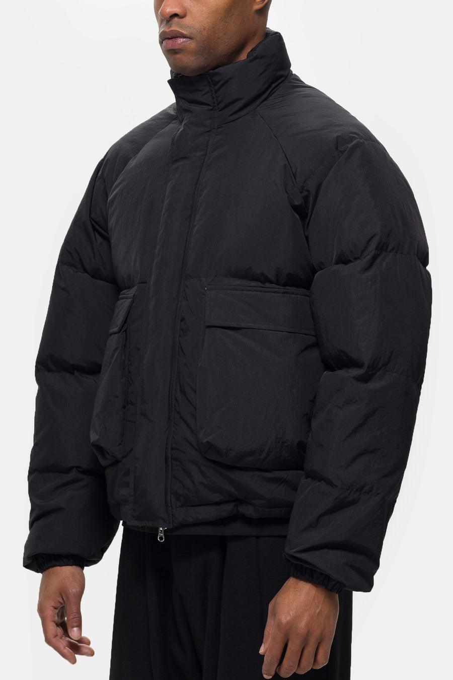 Estudio Niksen Raglan Puffer Jacket in Black - Notre