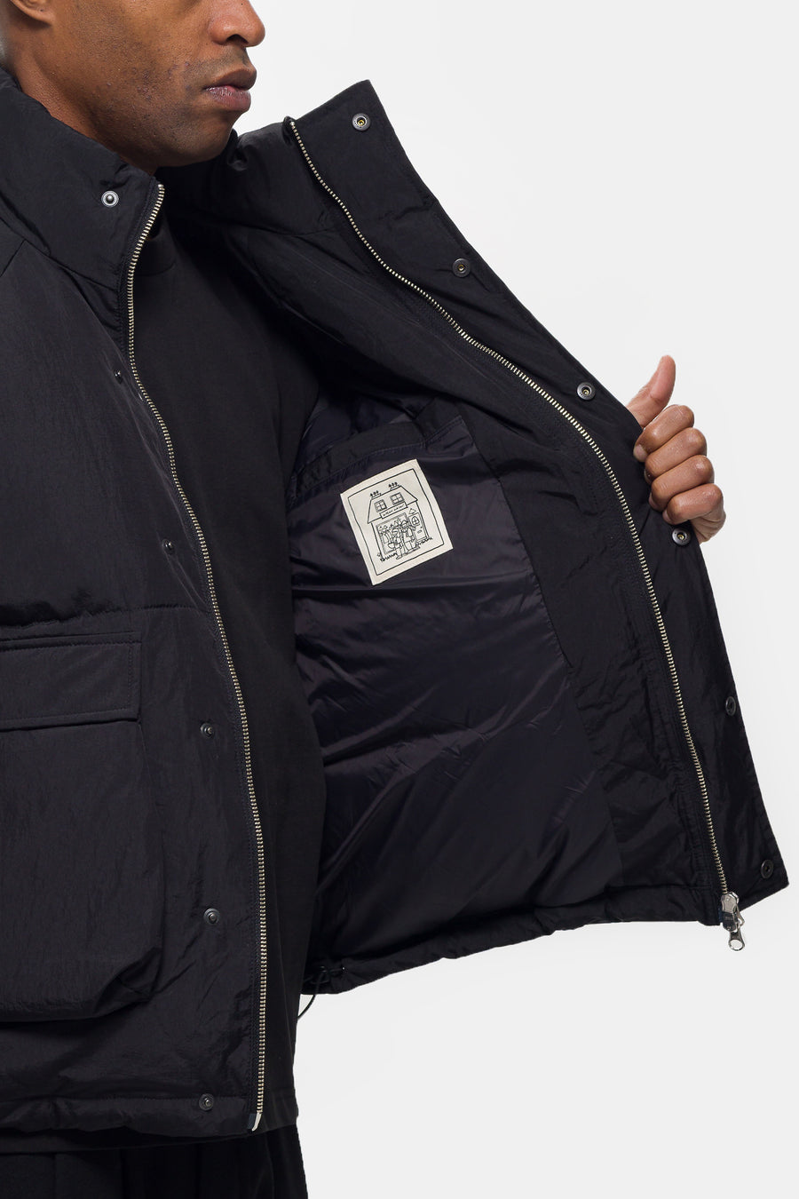 Estudio Niksen Raglan Puffer Jacket in Black - Notre