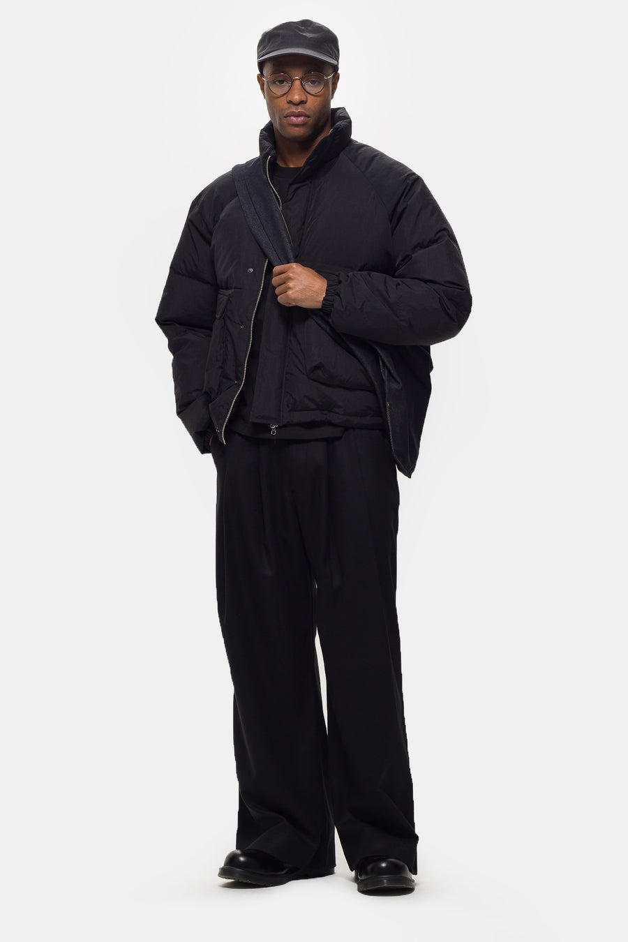Estudio Niksen Raglan Puffer Jacket in Black - Notre