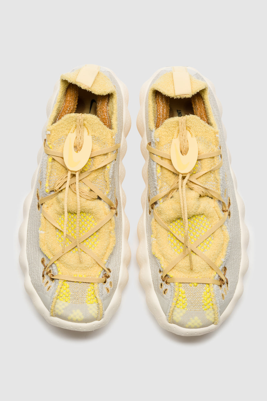 Nike Mind 002 Flyknit Sneaker in Light Bone/Saturn Gold/Infinite Gold - Notre