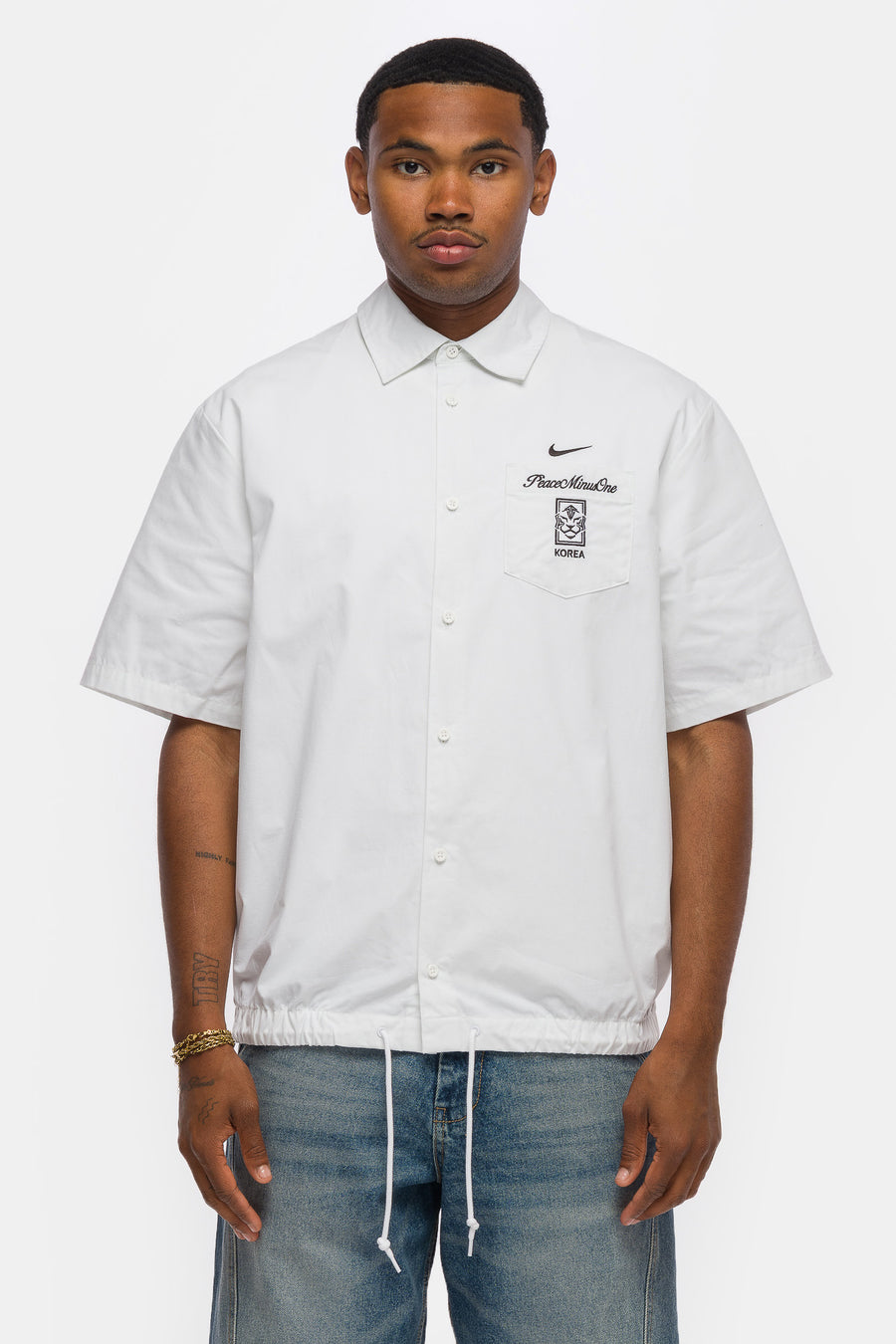 Nike PEACEMINUSONE x Korea Short Sleeve Shirt in White/Black - Notre