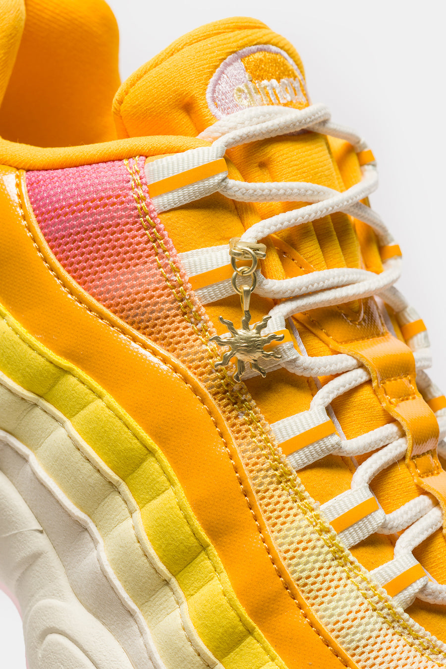 Nike Air Max 95 Big Bubble Sneaker in University Gold/Coconut Milk/Pink Foam - Notre