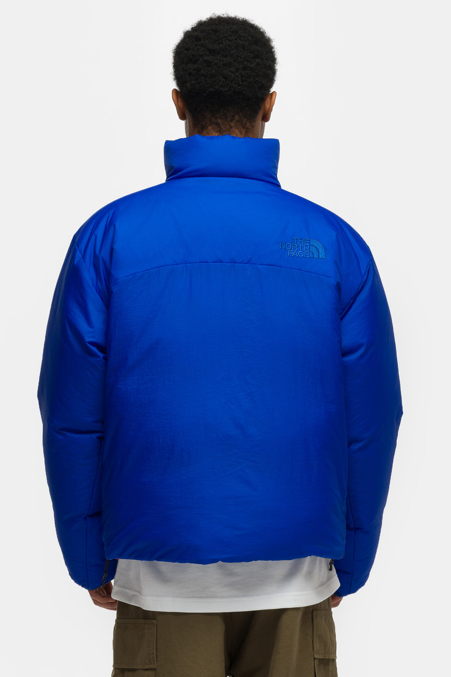The North Face Pertex Nuptse Reversible Jacket in TNF Blue/TNF Black - Notre