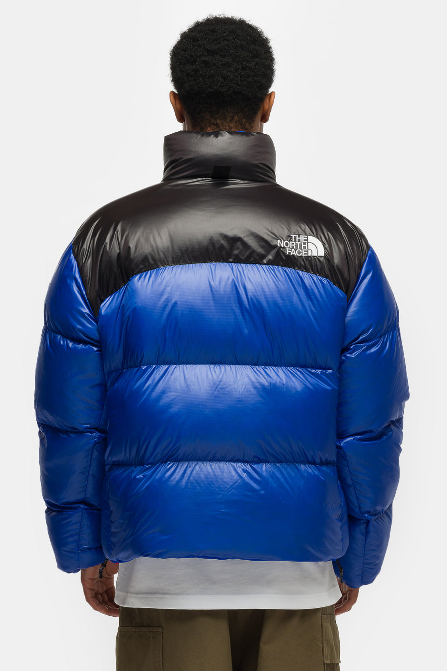The North Face Pertex Nuptse Reversible Jacket in TNF Blue/TNF Black - Notre